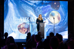 Megan Kenna addresses a gala Dinner